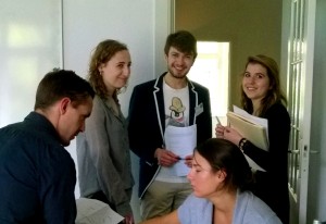 MEELS students discussing strategy in a simulation game provided by planpolitik